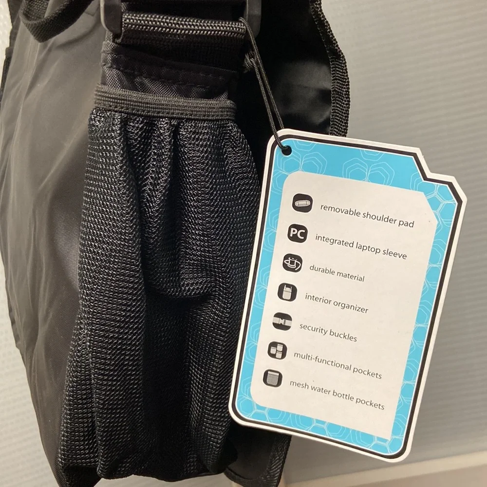 Messenger bag features laptop sleeve- multi- function pockets— Adjustable strap